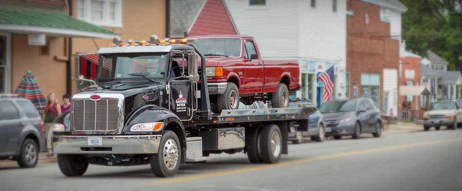 tow truck with pick-up truck